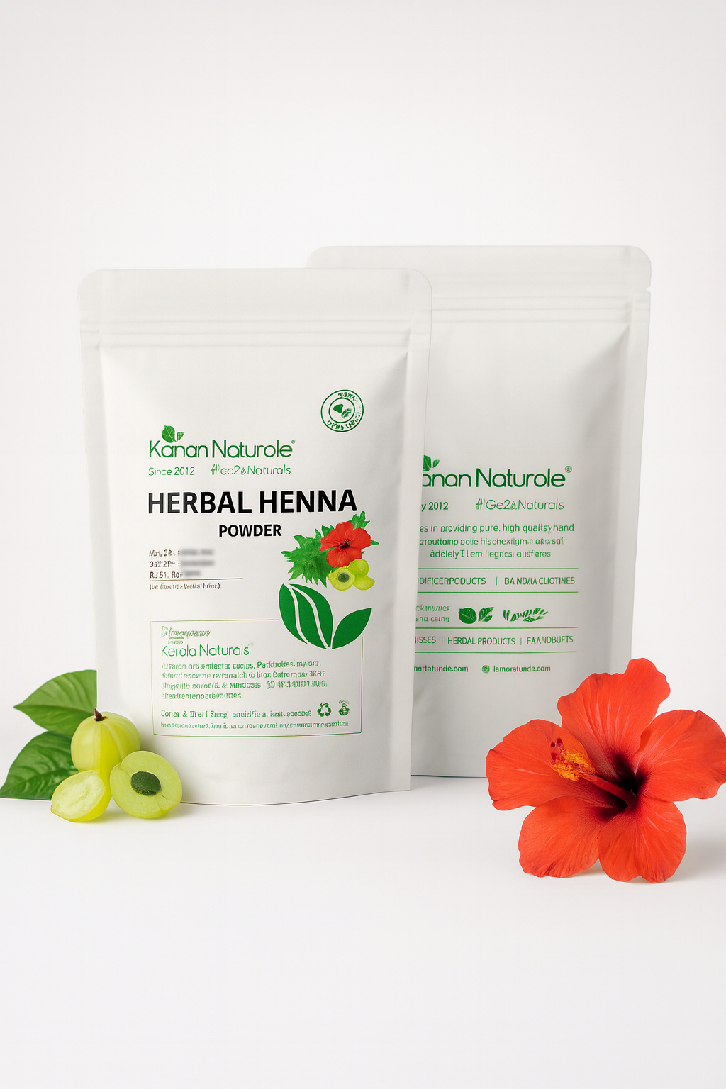 Two bags of Kanan Naturale Herbal Henna Powder with a red flower and green leaves on a white background